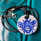 Clay round embossed bee necklace pendant blue 