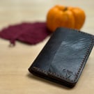 Bifold wallet made from repurposed saddle leather 