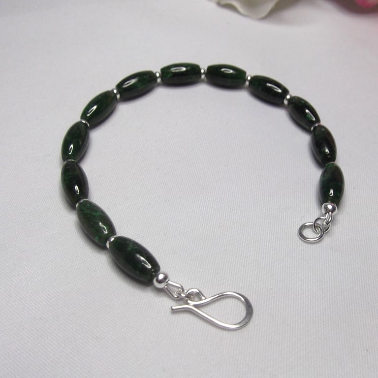 Green Jade gemstone bead bracelet with small recycled silver spacer beads