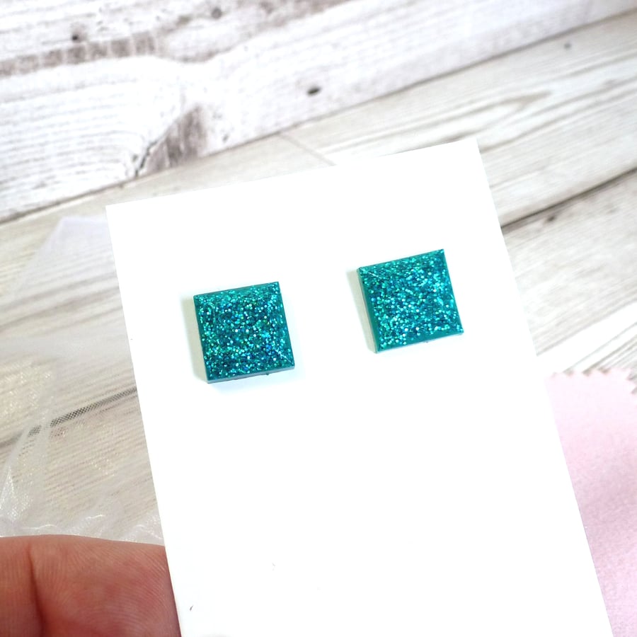 Turquoise glitter square studs. Bright turquoise sparkly earrings for women