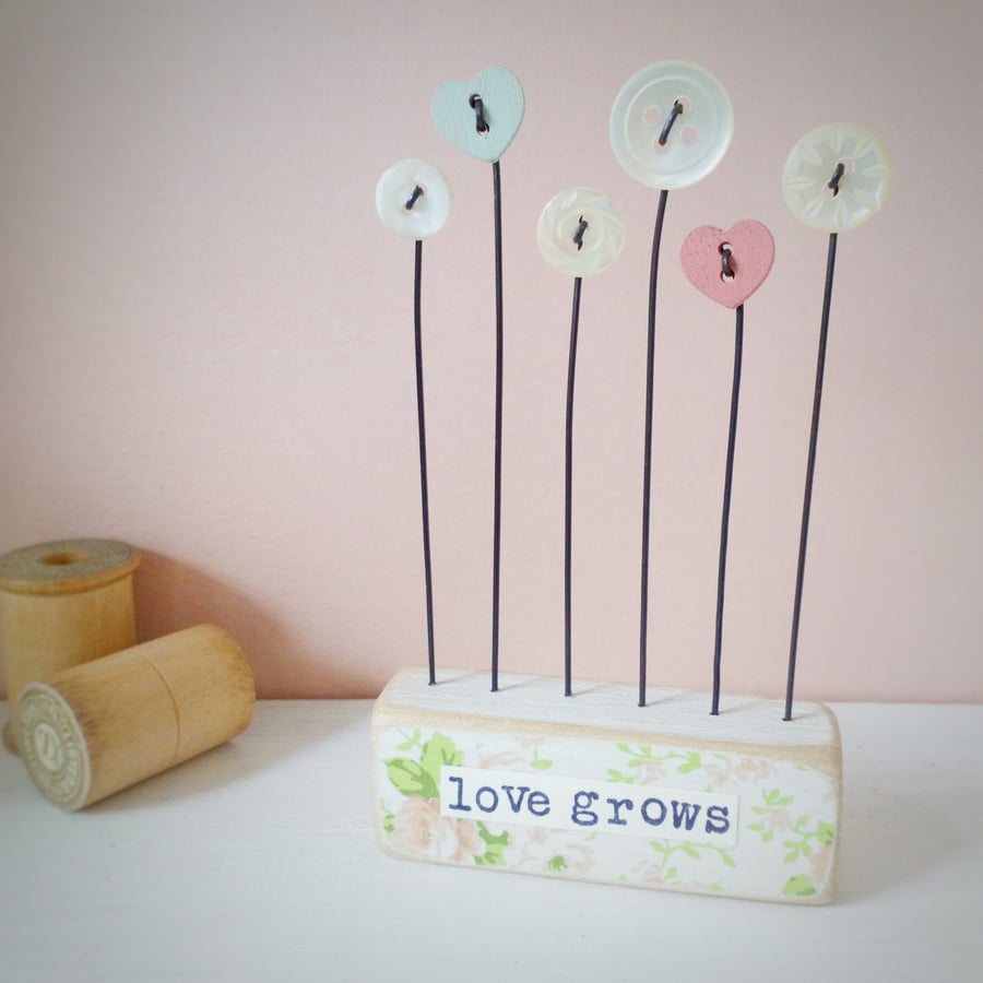 Button flower garden in a floral block 'love grows' 
