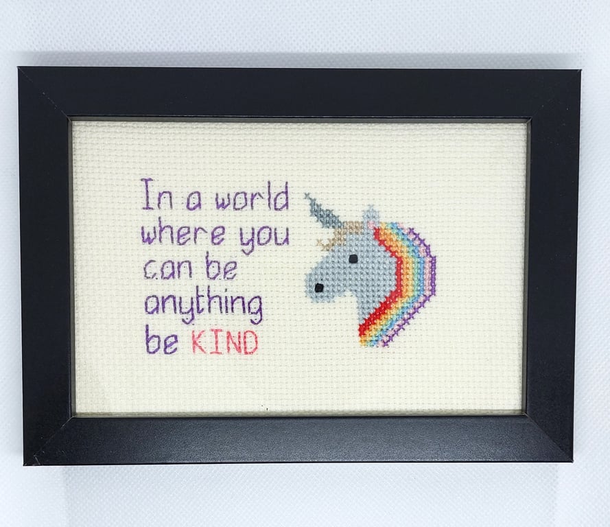 Framed unicorn picture in cross stitch