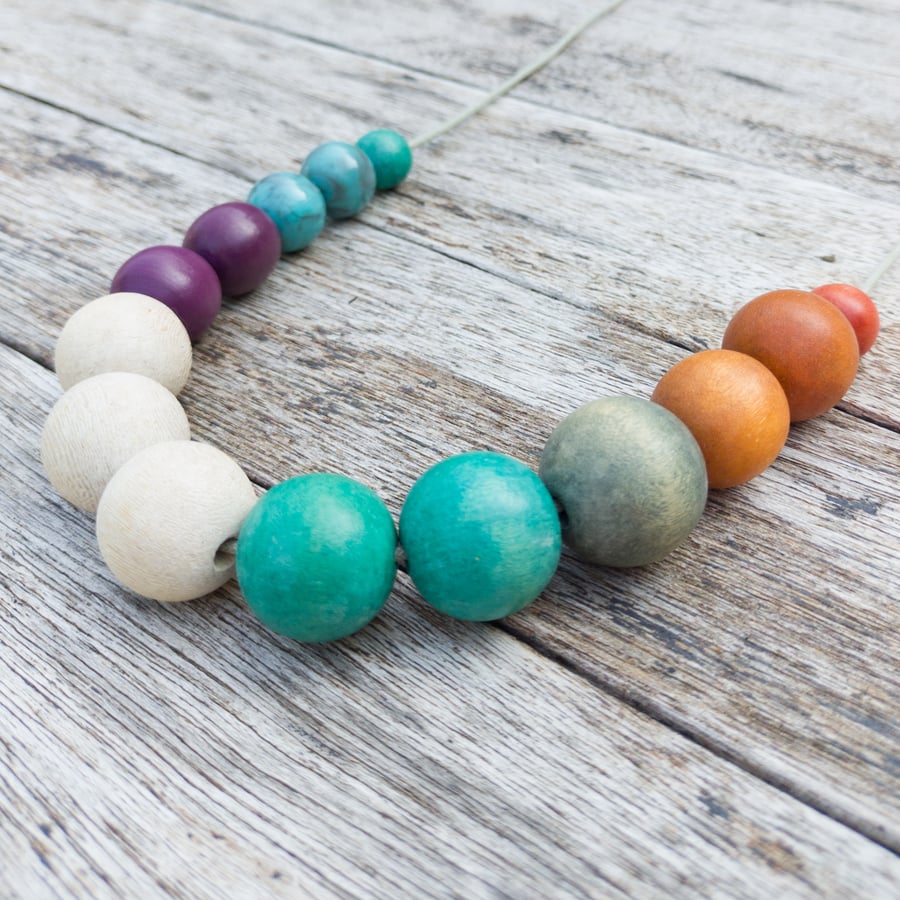 Kiki - upcycled wood and ceramic bead necklace, purple, white, blue and tan