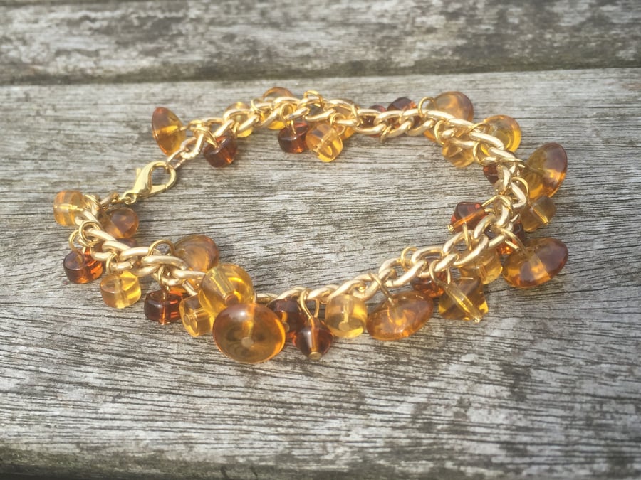 Glass amber beads on gold bracelet