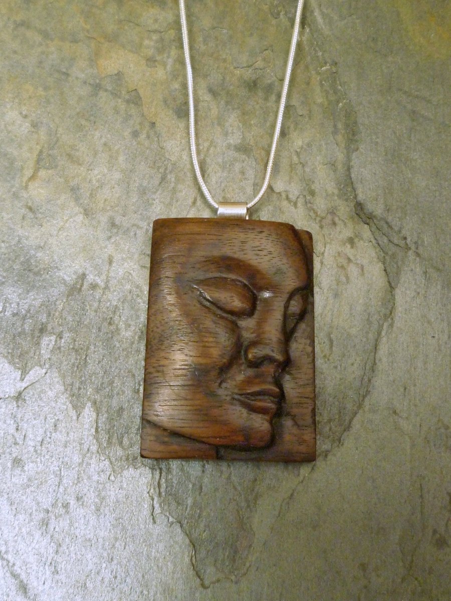 Hand Carved wooden face pendant, wood silver