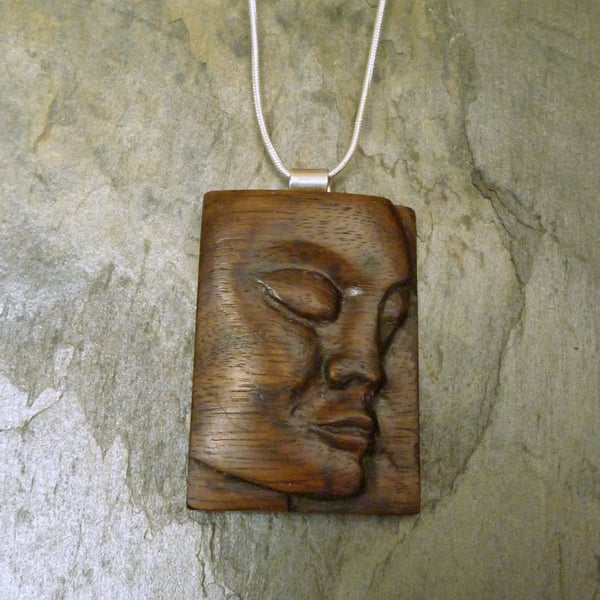 Hand Carved wooden face pendant, wood silver