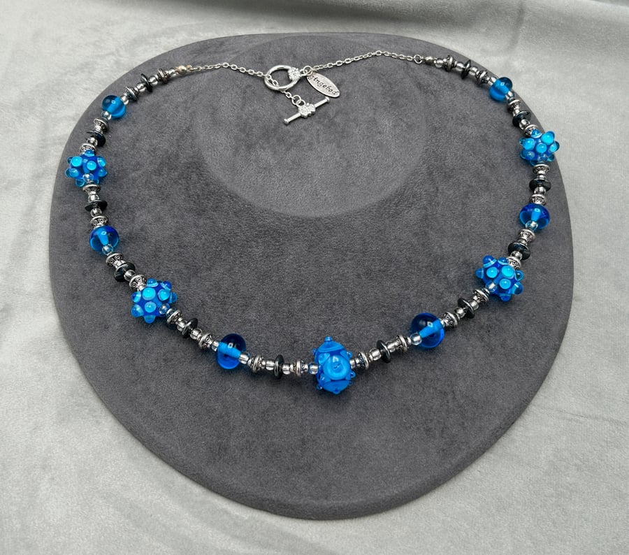 turquoise blue lampwork glass and haematite beaded necklace