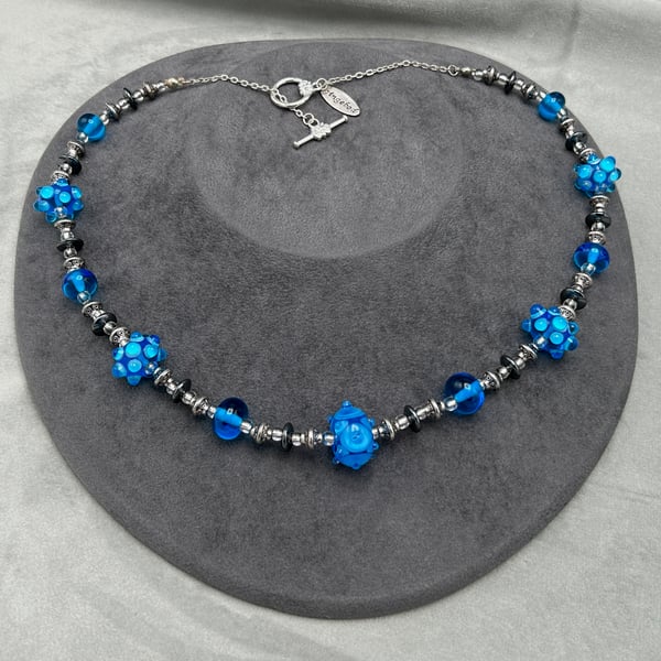 turquoise blue lampwork glass and haematite beaded necklace