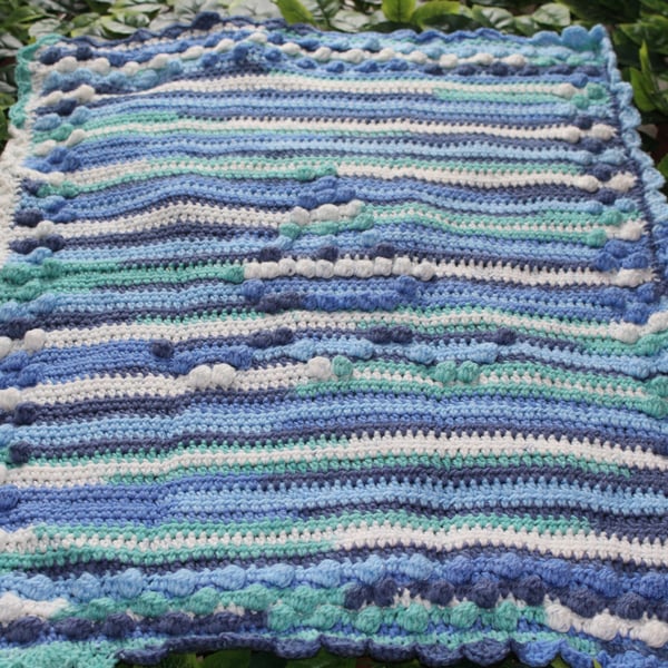 handmade crochet baby bobble blanket with boat design