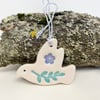 Teeny ceramic dove decoration with leaves and lilac flower