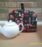 Small Teacosy with London Scenes on Black