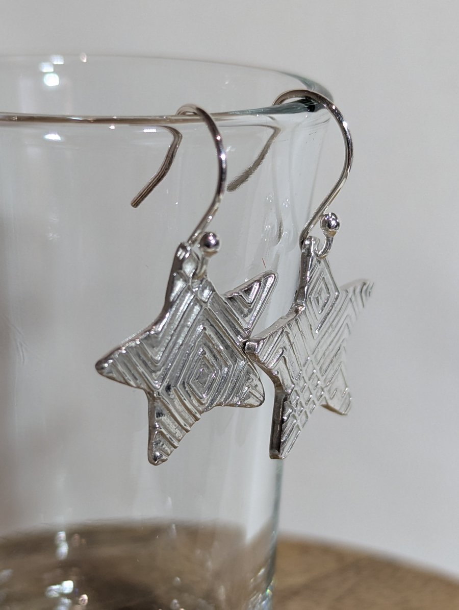 Fine silver star earrings