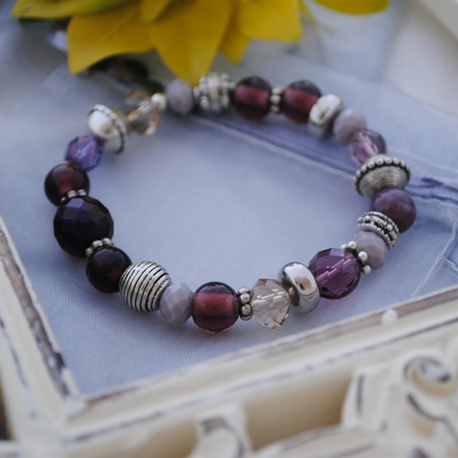 Silver and purple bead stretch bracelet