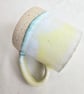 A handmade stoneware mug in yellow, green and oatmeal - Image 6