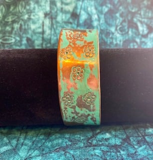 Daisy motif copper cuff