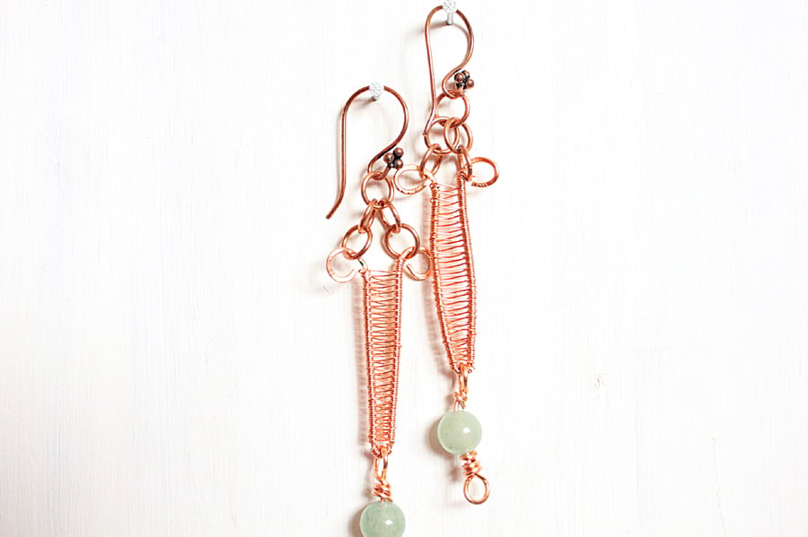 Copper wire wrapped dagger earrings with pale green aventurine bead dangles