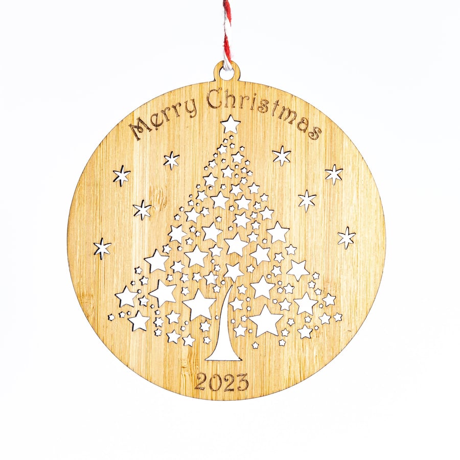 Merry Christmas Star Tree Ornament. Sustainable bamboo decoration with engraving