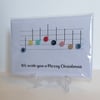 We wish you a Merry Christmas card with musical notes