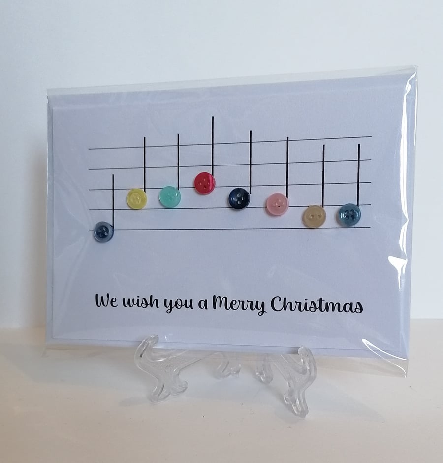 We wish you a Merry Christmas card with musical notes