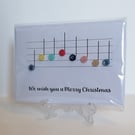 We wish you a Merry Christmas card with musical notes