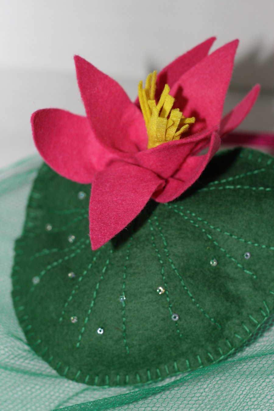 Green and hot pink waterlily fascinator