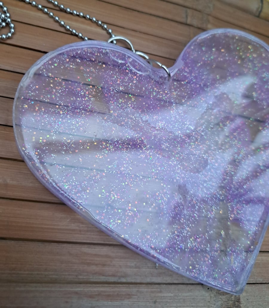 Purple resin glitter heart on a chain