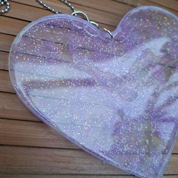 Purple resin glitter heart on a chain