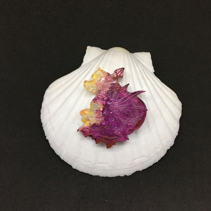 Dragon statement brooch, pink and yellow ink and resin.