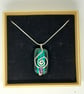 Emerald Glass and Silver Spiral Pendant - Image 6