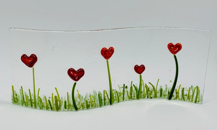 Hand made fused glass heart wave. 
