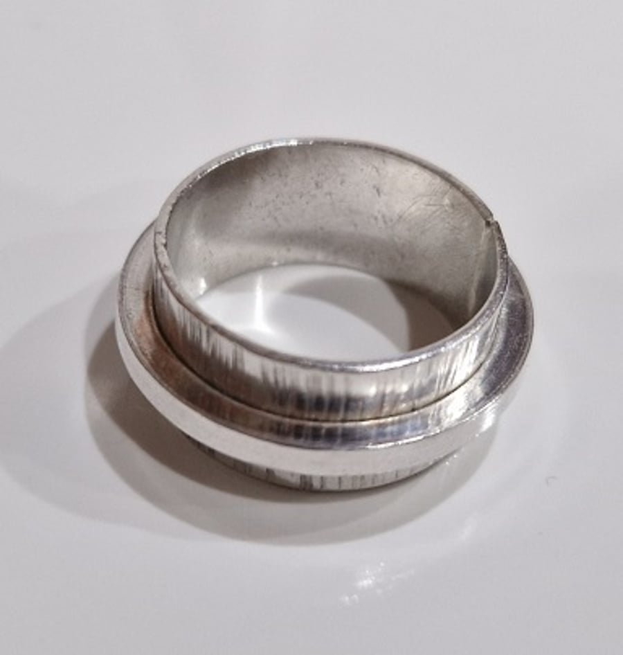 Handmade, recycled, textured sterling silver ring with band