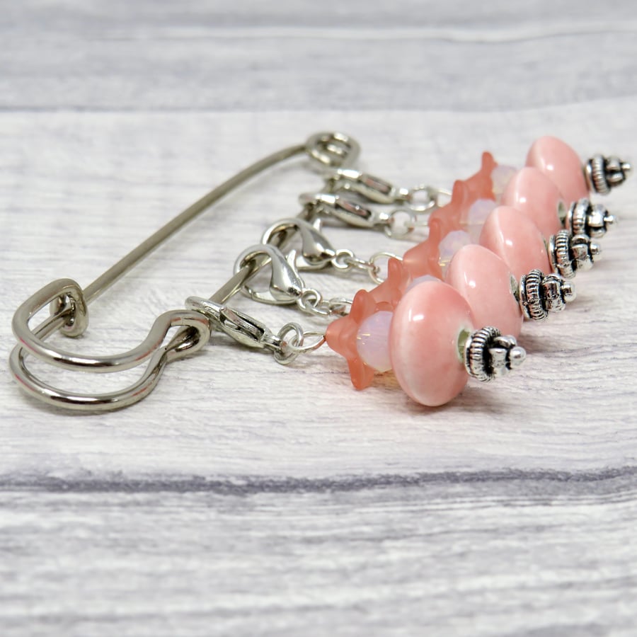 Pink beaded stitch markers