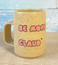 Be more Claude' mug.