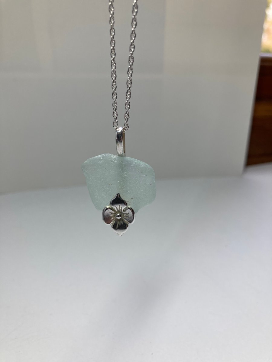  Sterling silver necklace with white sea glass pendant in a SP daisy mount
