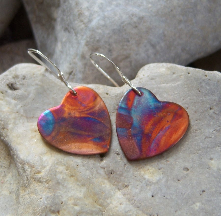 Heart earring in flame painted copper