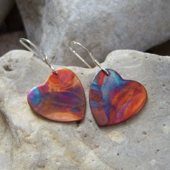 Heart earring in flame painted copper