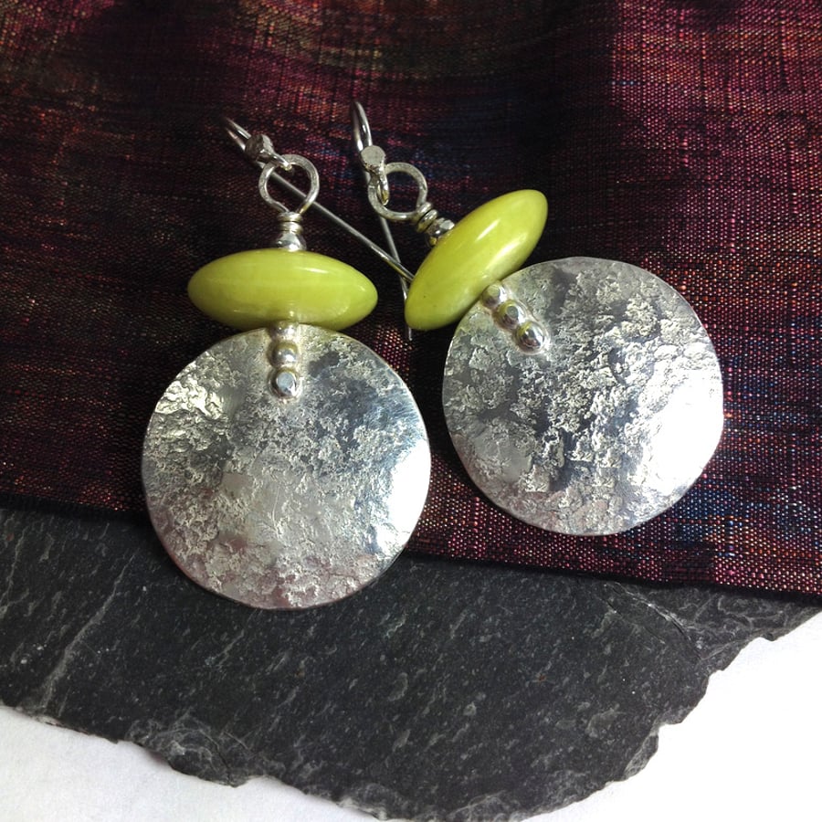 Large round silver and chartreuse stone earrings 