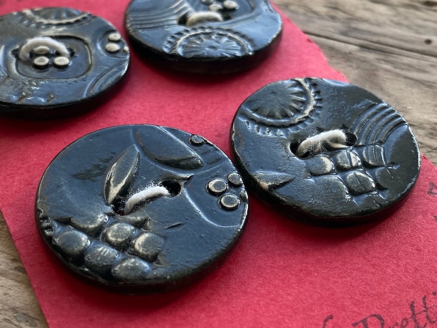Handmade Ceramic set of Four Black Buttons 