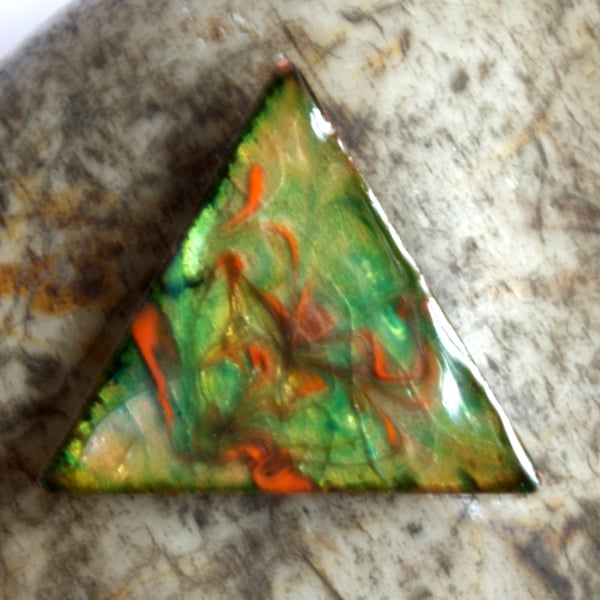orange scrolled on green - triangular brooch