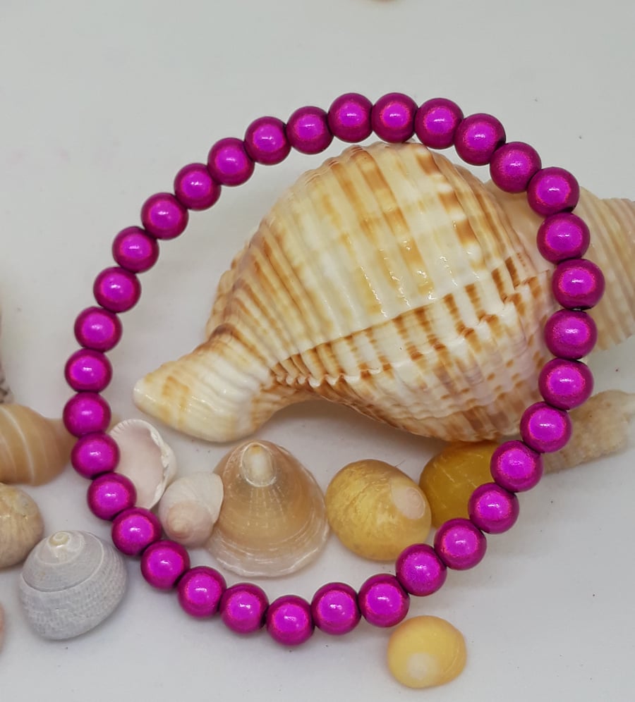 BR475 Pink miracle bead bracelet