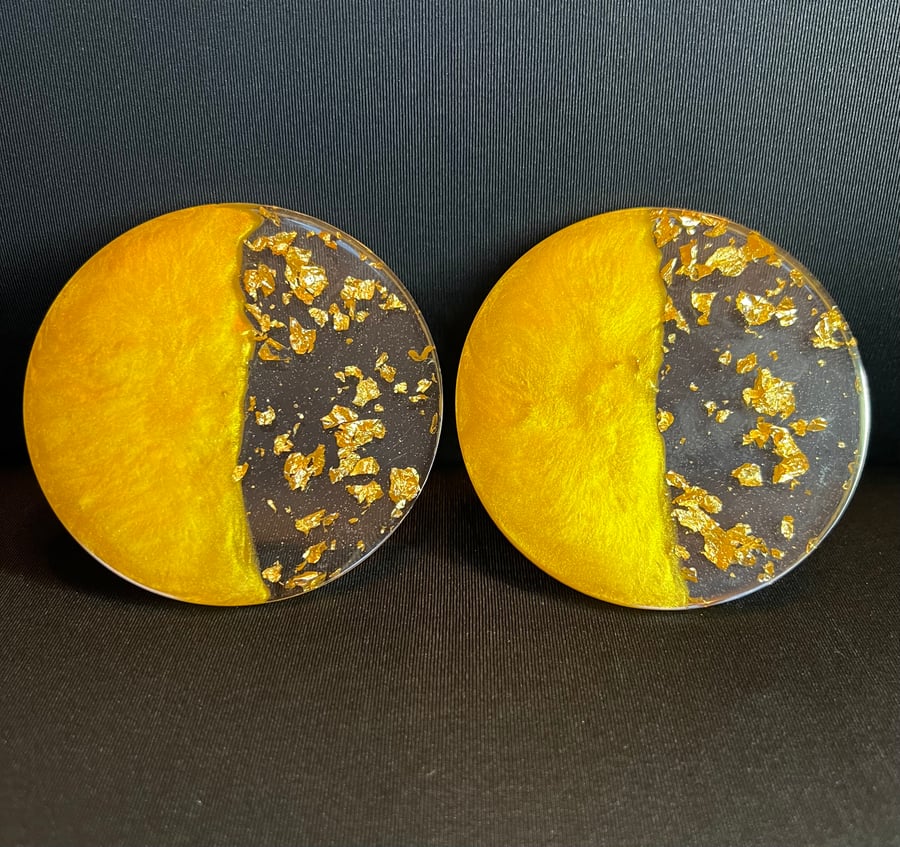 Set of 2 golden yellow and gold leaf coasters.