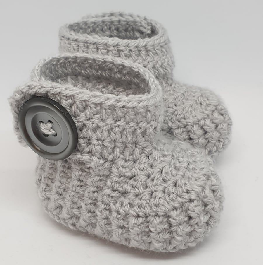 Crochet newborn baby booties in silver grey