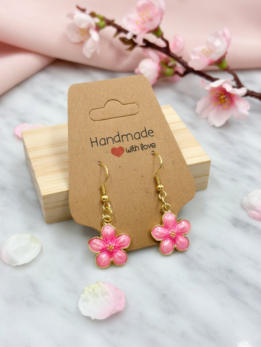 Celebrate delicate beauty with these charming handmade flower earrings.