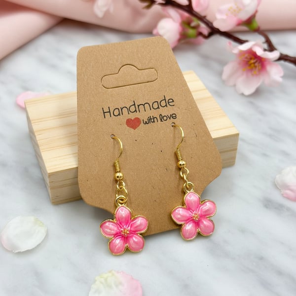 Celebrate delicate beauty with these charming handmade flower earrings.