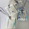 Fused glass hanging decoration with etched snowflakes