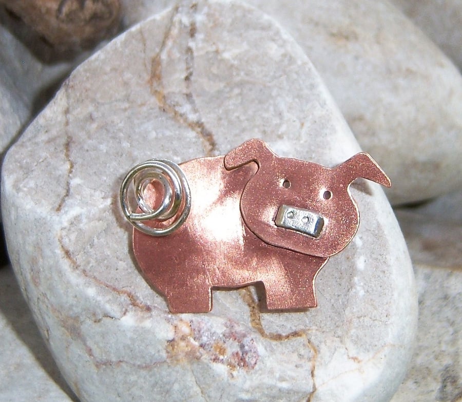 Copper pig brooch