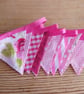 Handmade mini bunting in a pink theme.