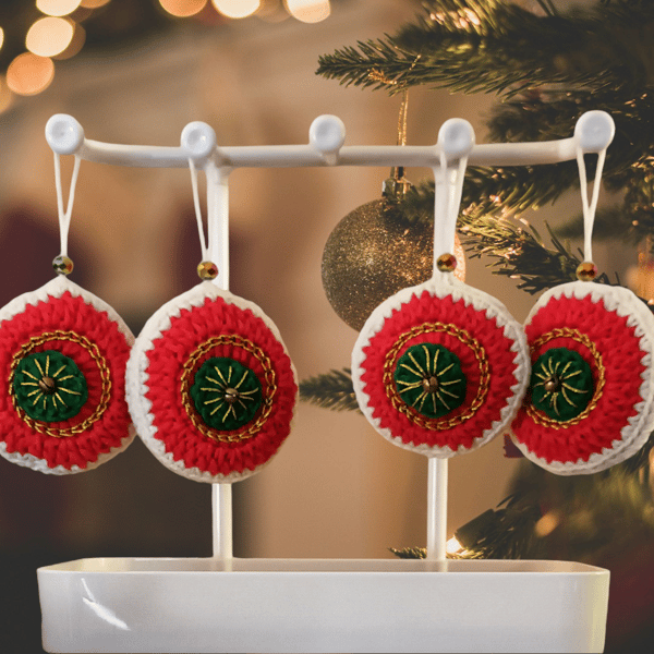 Set of 4 red, green, white, and gold Christmas tree decorations 