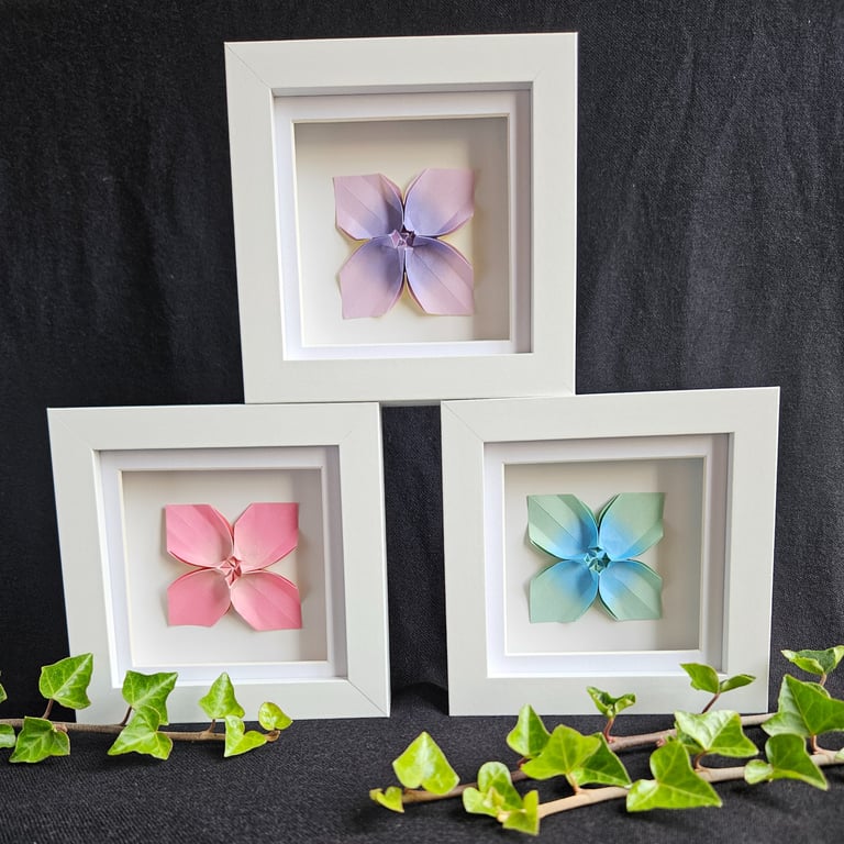 Set of three origami flowers in shadow box frames