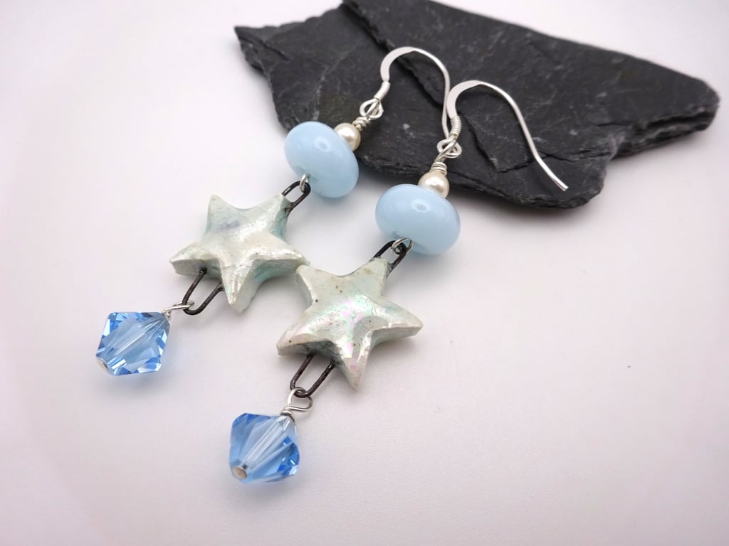 blue lampwork glass earrings, ceramic stars